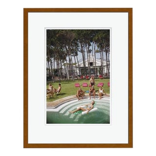 Marbella House Party 1976 by Slim Aarons Framed C Print For Sale