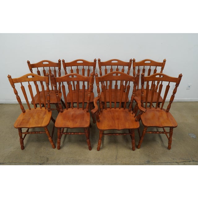This vintage set of Tell City dining chairs embodies classic Early American Colonial style, crafted in solid wood with...