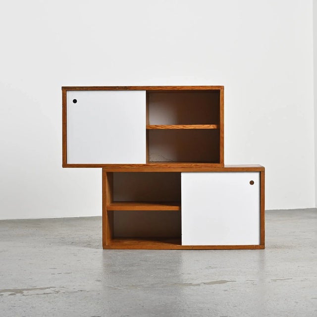 Pair of varnished Oregon pine end tables, designed by Pierre Guariche for the Hotel Le France in La Plagne, circa 1965....