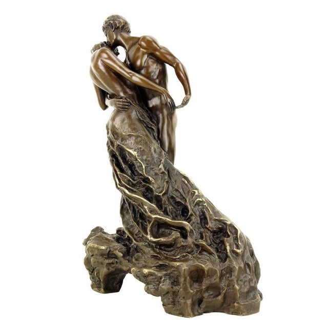 20th century modern brown patinated bronze sculpture. This figurative bronze sculpture depicts a dancing couple turning in...