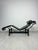 Iconic original ‘lc4’ chaise longue by cassina in the sought-after all black version with black leather upholstery and...