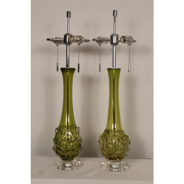 Beautiful pair of scalloped Murano glass lamps. Graceful sculptural shape. Decorated with glass overlay scallops.Avocado...