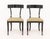 Pair of Contemporary Ebonized Wood Klismos Dining Chairs, with geometric light green upholstered seat on curved tapered...