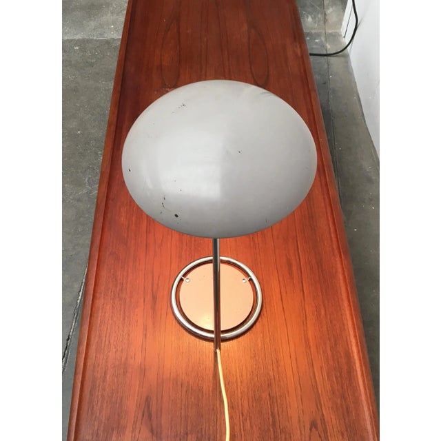 Very rare 6761 table lamp from Kaiser Leuchten. The special feature of this table lamp is the design of the base, which...