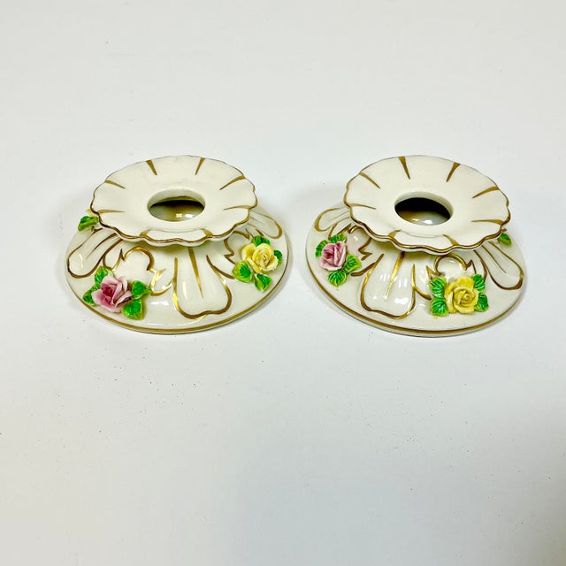 The Dresden Porcelain factory produced decor and tableware from 1872 to 2020. This is a lovely pair of low-rise taper...
