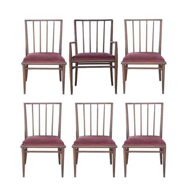A set of 6 dining chairs designed by T.H. Robsjohn Gibbings and made by Widdicomb. Set includes one armchair and 5 side...