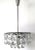 High-quality crystal chandelier from around 1960. 6x6 cm hand-cut crystal elements. Very difficult. 7 sockets E14 This...