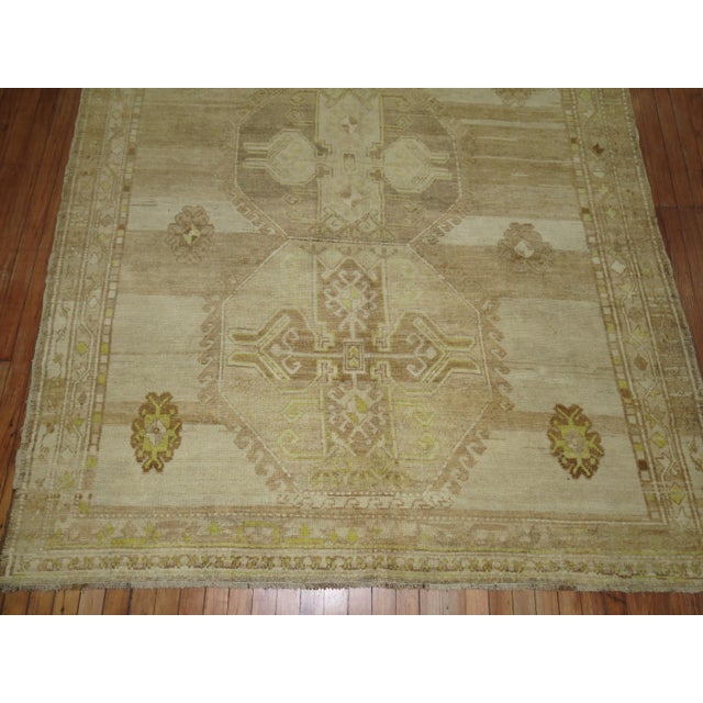 Turkish Kars featuring lime green accent cotton highlights on a neutral color field 6'2'' x 8'6''