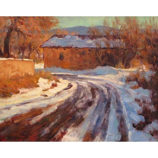 Arroyo Seco Winter by Lorenzo Chavez | Oil Painting of a snowy road and rustic building For Sale