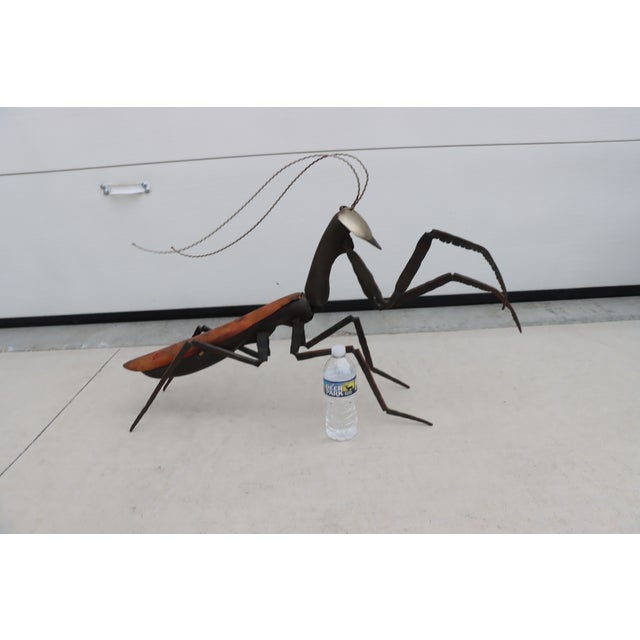 Late 20th Century steel praying mantis sculpture, made and signed by artist Paul Lockhart of Baltimore.