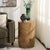 Introducing the Siya Round Accent Table, a stunning merger of beauty and utility. Its design is inspired by the rustic...