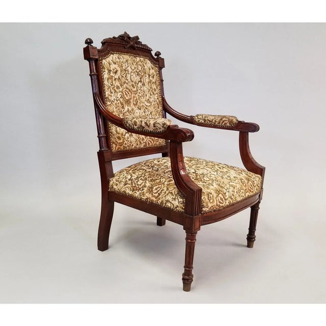 Circa 1910 Pair of French Louis XVI Style Armchairs. These marvelous Louis XVI style armchairs have a nicely wooden carved...