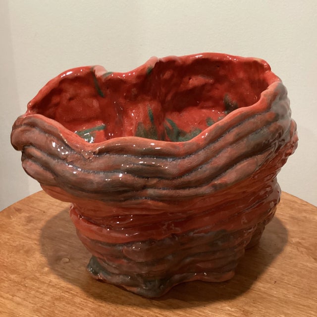 This Decorative Table Vase will lend a touch of artisanal flair to your modern or contemporary ensemble. Constructed from...