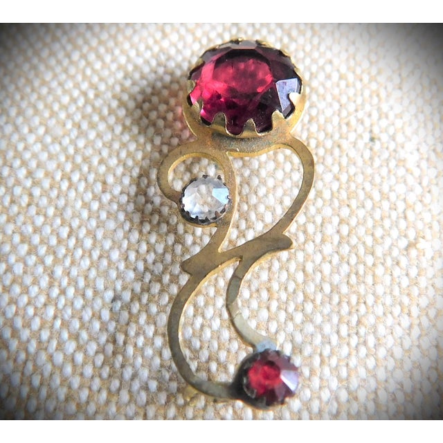 Antique 10K Gold Pair of Art Nouveau Brooch Pins, C. 1900-1910. One pin has a large round deep blue faceted stone, the...