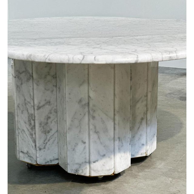 Width: 119 cm Depth: 119 cm Height: 48 cm An exceptional Postmodern coffee table crafted entirely from Carrara marble,...