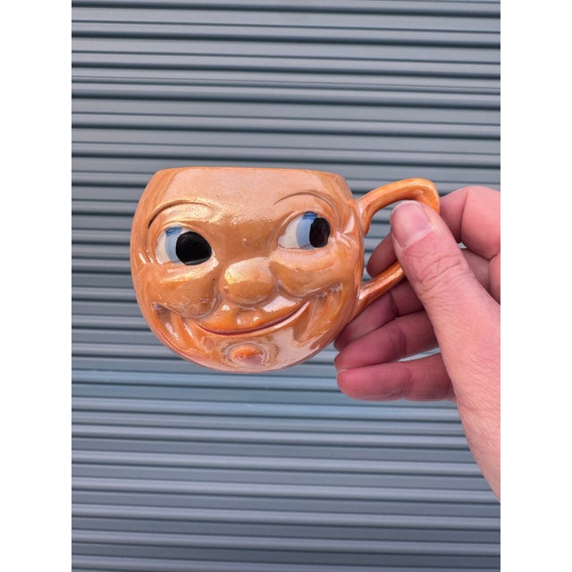 Whimsical, expressive, and wonderfully collectible, this set of four vintage “Man in the Moon” porcelain mugs captures the...