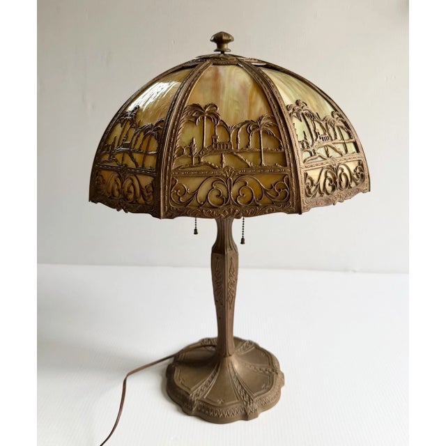 Beautiful slag glass lamp. No brand name markings but this is very possibly produced by Edward Miller & Co. Needs some...