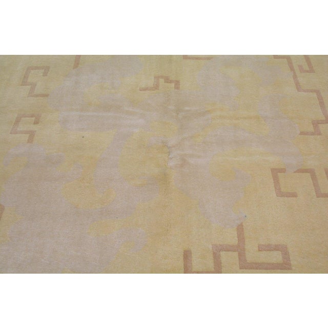 Hand-knotted with care using traditional rug-making techniques, this wool rug blends timeless craftsmanship with a modern...