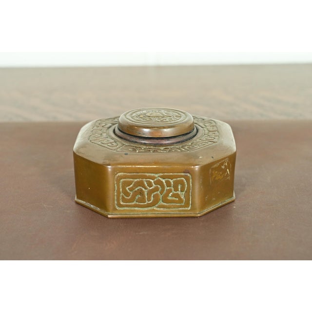 A gorgeous antique Arts & Crafts or Art Deco period "Zodiac" pattern bronze inkwell By Tiffany Studios (signed to the...