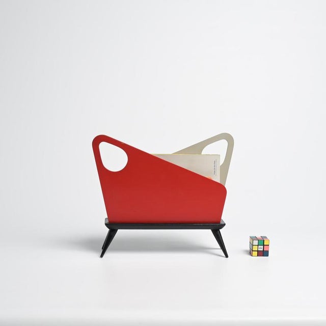 This super 1950s magazine rack was made in belgium by bois manu in the 1950s. Architects and designers reconnected with...
