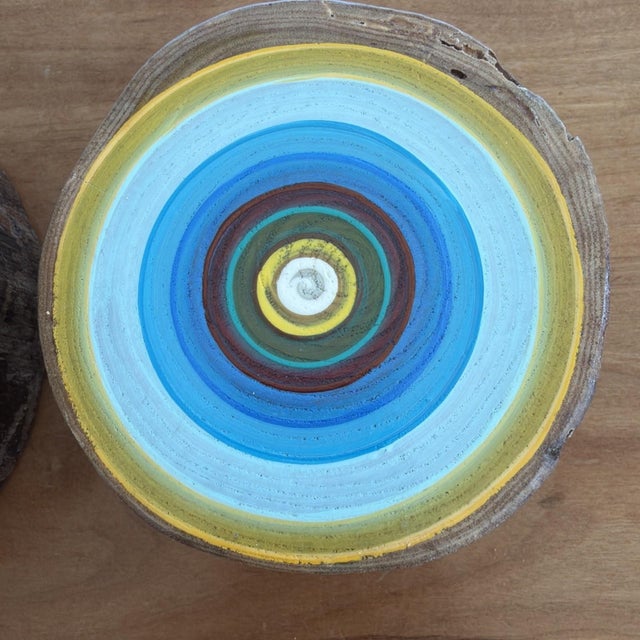 Set of two hand-painted wood art blocks created from real tree sections and signed by artist Tracy Melton. Each piece...