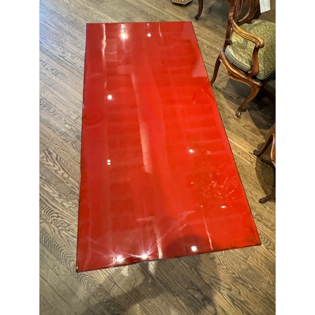 Large Asian Style Coffee Table/low table in a chinese red lacquer with dark bowl showing through.