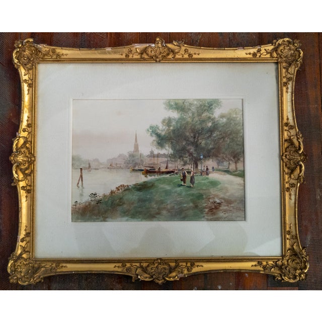 We are selling this pretty Watercolor landscape painting of what appears to be a European city. The watercolor is signed...