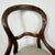 Fine quality traditional form most likely mahogany Victorian balloon-back chair, upholstered in light patterned fabric....