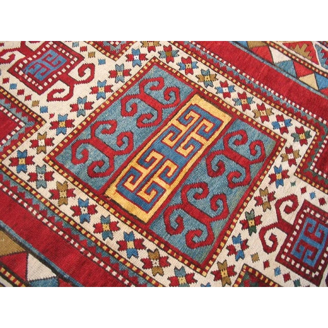 1930s Ruby Red Abstract Tribal Antique Caucasian Kazak Rug 4'4" X 5'3" Knotted Wool Carpet For Sale - Image 4 of 9