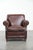 Beautiful sheepskin armchair with warm colors and a classic finish featuring decorative studs and beautiful stitching. :...