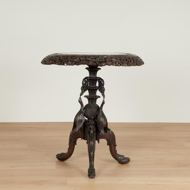 Impressive 19th century Anglo Indian tilt top table handcrafted in well grained rosewood with a round top featuring...