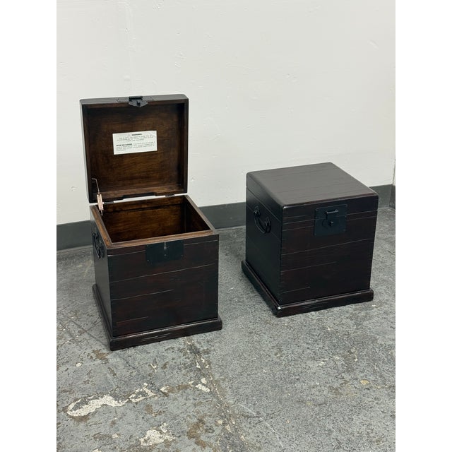 Design Plus Gallery presents pair of the Emmett Trunk Side Tables from Pottery Barn. These trunk-style tables are...
