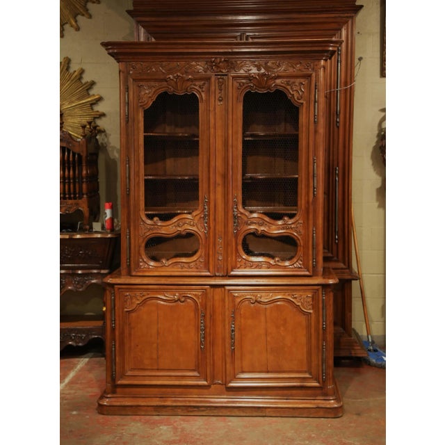 This museum-quality antique buffet à deux-corps was crafted in Normandy, France circa 1760. Made of richly patinated oak,...