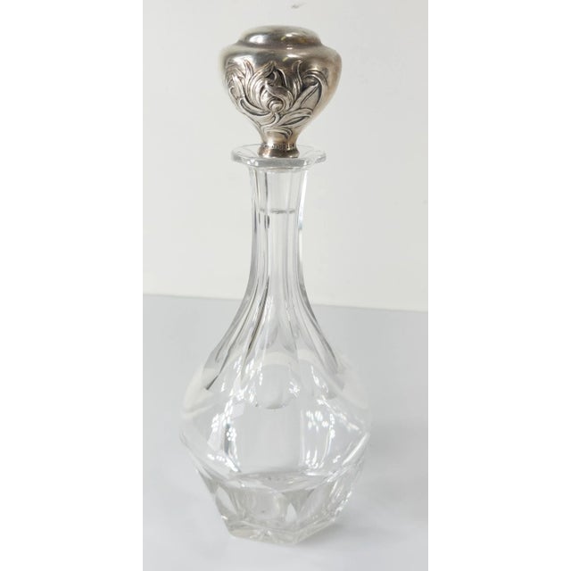 We are selling this pretty decorative crystal glass decanter with Art Nouveau style sterling silver stopper by Gorham....