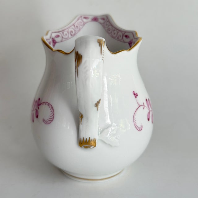 Milk jug Series: New Cutout Decoration: Indian Painting Purple Material: Porcelain Dimensions approx. H=8.5 cm This piece...