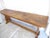 This weathered, rustic pine console table has a crossbar and is 28.5"H x 84"L x 17.25"D.
