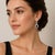 Platinum & 18k White gold hand fabricated earrings containing 2 AGL cerified no heat sapphires weighing 4.84 carats and 24...