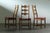 This set of 6 carved light oak ladder-back chairs, familiar to the "Razorblade" model, designed by Henning Kjærnulf....