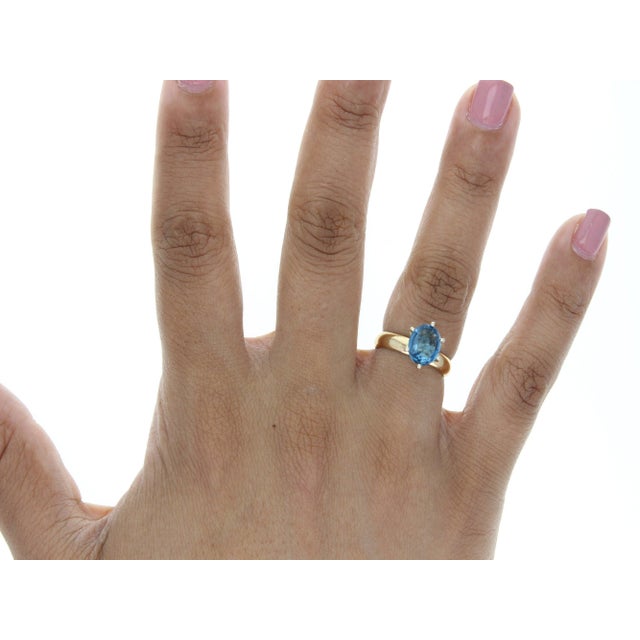 ♥ Product Summary ♥ Main Stone: London Blue Topaz Approx. Carat Weight: 1.00cttw Stone Cut: Oval Band Material: 14k Yellow...