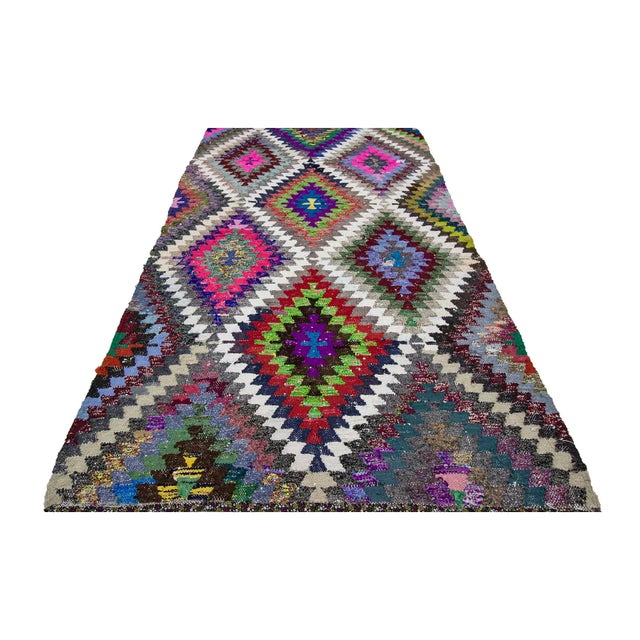 Handwoven vintage colorful kilim rug from Denizli region of Turkey. Approximately 40-50 years old. In very good condition