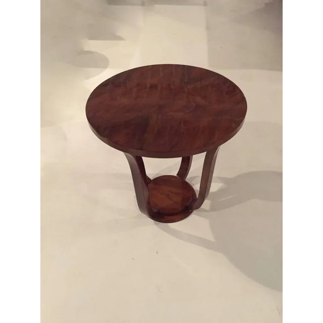 A striking French Art Deco center table, circa 1940s. Beautiful wood and has been restored with a high French polish. Very...