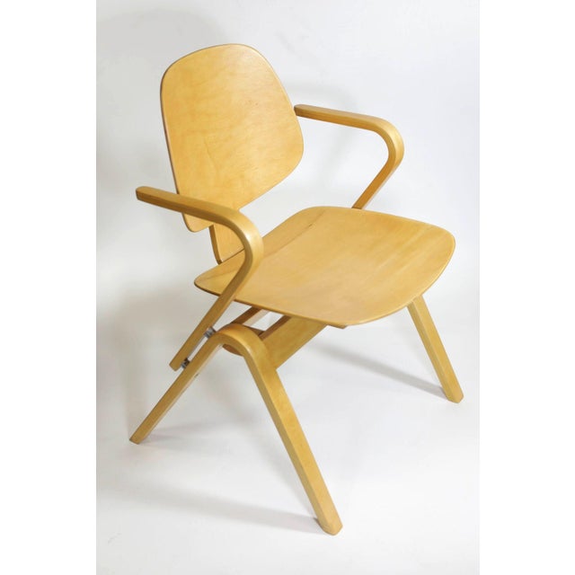 Set of five bent plywood armchair dining chairs Designed by Joe Atkinson for the Thonet furniture company. Each chair...