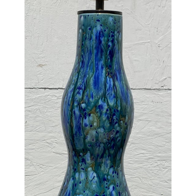 Beautiful hues of blue To green to turquoise glazed Lamps. Circa 1960 these lovely “ double gourd” formed lamps represents...