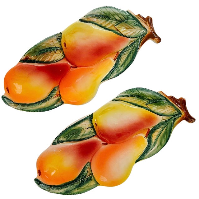 Beautiful set of two Italian trompe-l'oeil majolica spoon rests or appetizer plates featuring bunches of pears. The...