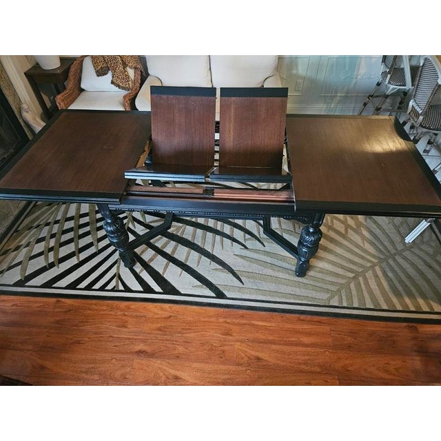 Mid-century restored dining table with 2 stored leaves. Dimensions are 41" x 61' opens to 101" for seating 10 guests. Very...