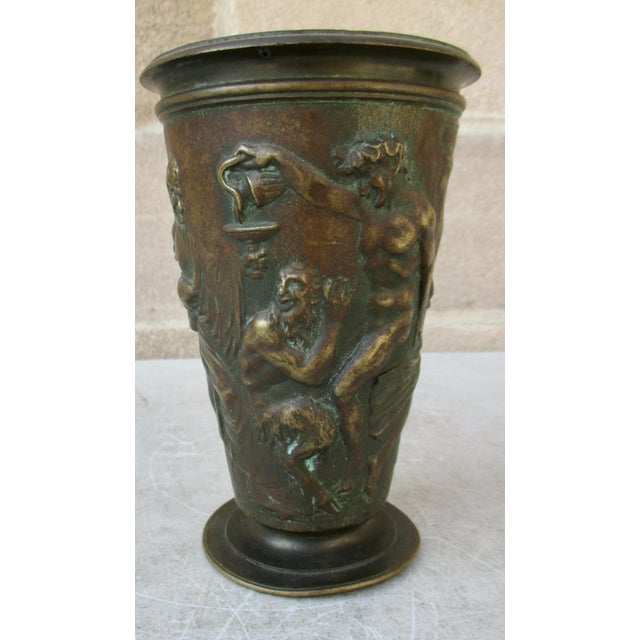 A fine bronze cast of Roman or Greek bacchanal with satyrs and maenads proceeding around the outer surface. The Classic...