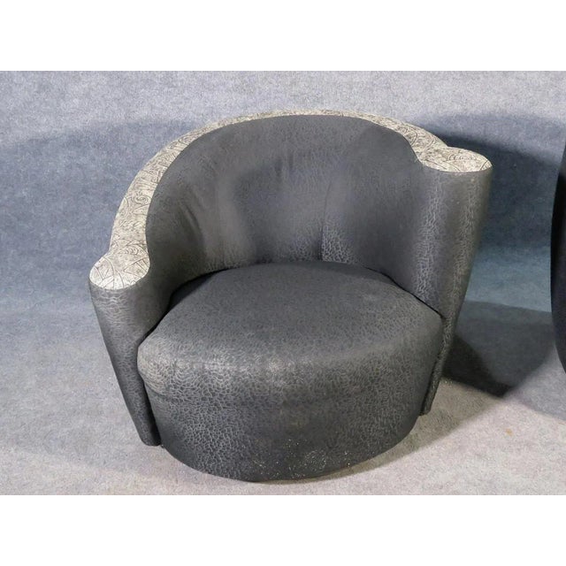 Mid-Century Modern swivel chairs.