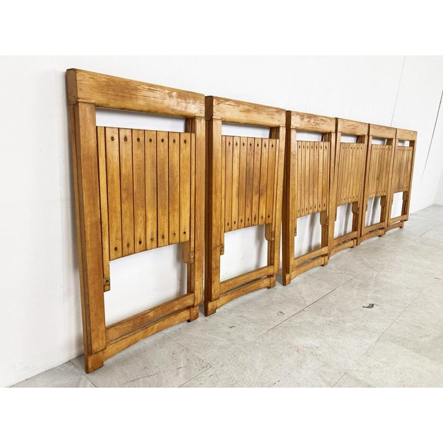 Beautiful Mid century modern wooden folding chairs. The chairs are well made and very sturdy. Good condition. 1960s -...