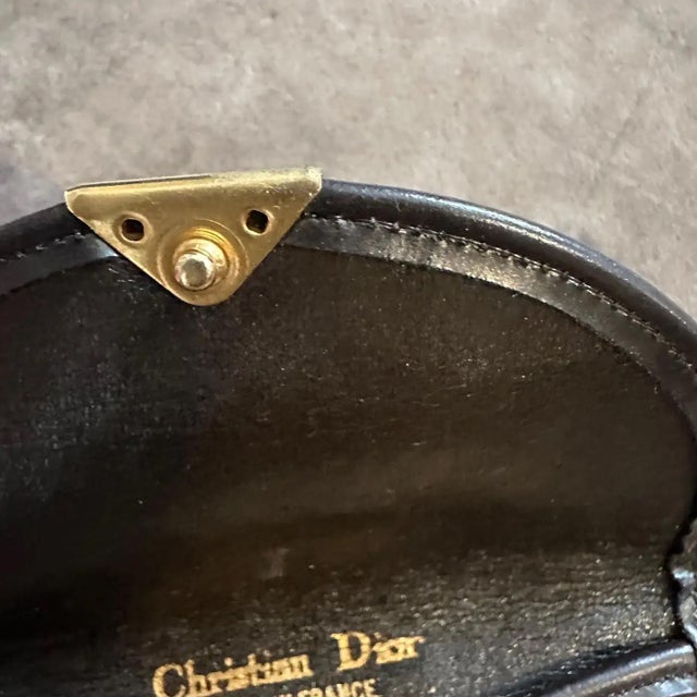 This timeless accessory from Christian Dior is a versatile and chic piece, ideal for carrying a cell phone, smartphone, or...