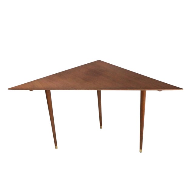 Mid Century triangular corner table. made in the USA, circa 1950's design reminiscent of Harvey Probber, unsigned. This...